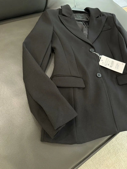 Shoulder-Padded Waist-Cinching Blazer | Wovetsa