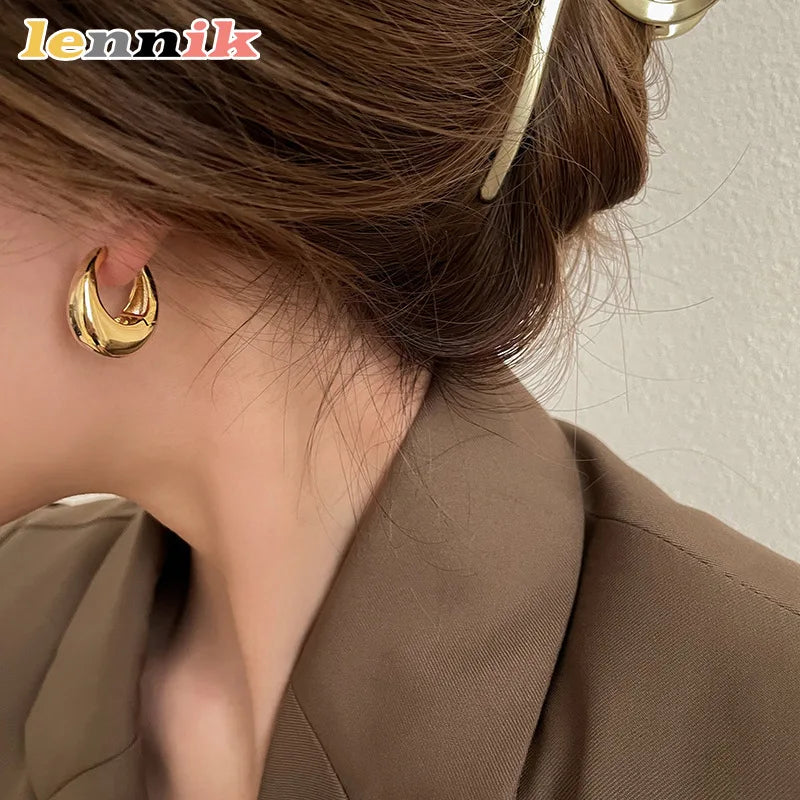 3D Oval Metal Stud Earrings | Wovetsa