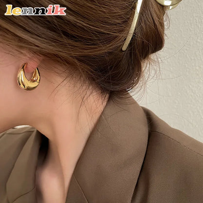 3D Oval Metal Stud Earrings | Wovetsa