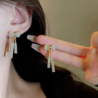 Gold Bow Stud Earrings with Rhinestone | Wovetsa