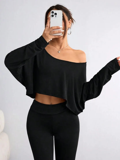 Asymmetric Neck Sleeveless Stretch Knit Top | Wovetsa