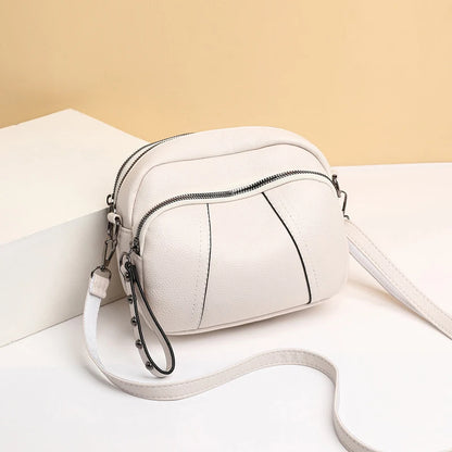 Rivet Mini Crossbody Bag | Wovetsa