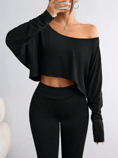 Asymmetric Neck Sleeveless Stretch Knit Top | Wovetsa